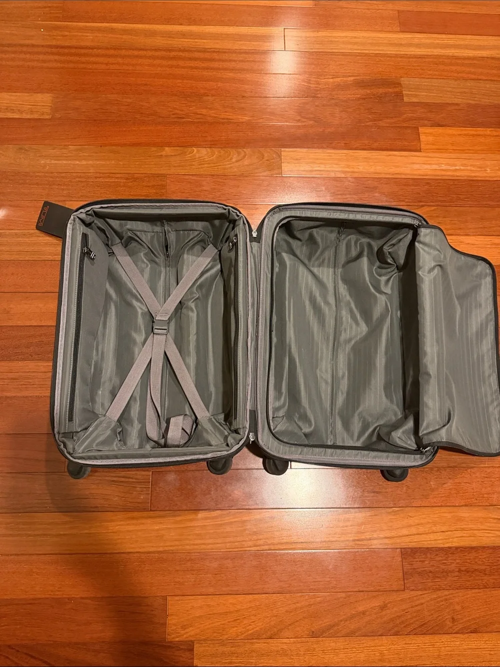 Tumi Black Upright Carry-On with Front Pocket